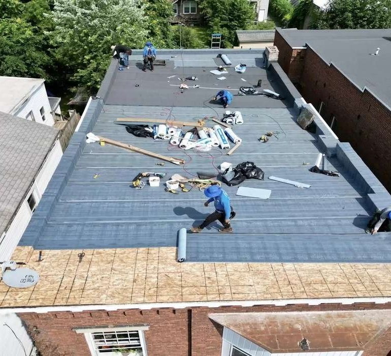 Modified flat roof installation project on a commercial building in Albany NY