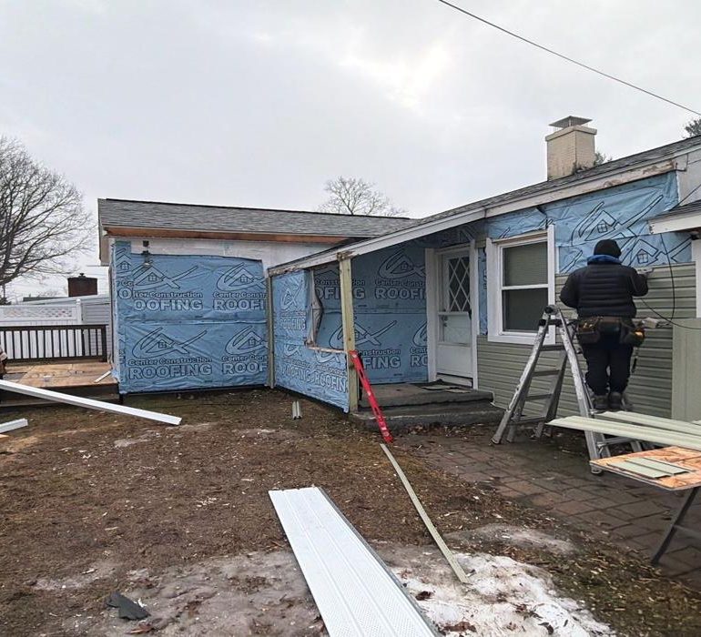 Professional residential roofing installation in progress by experienced contractors