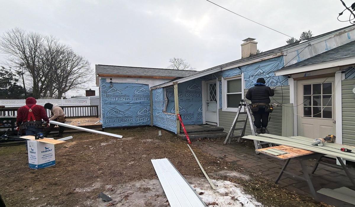 Professional residential roofing installation in progress by experienced contractors