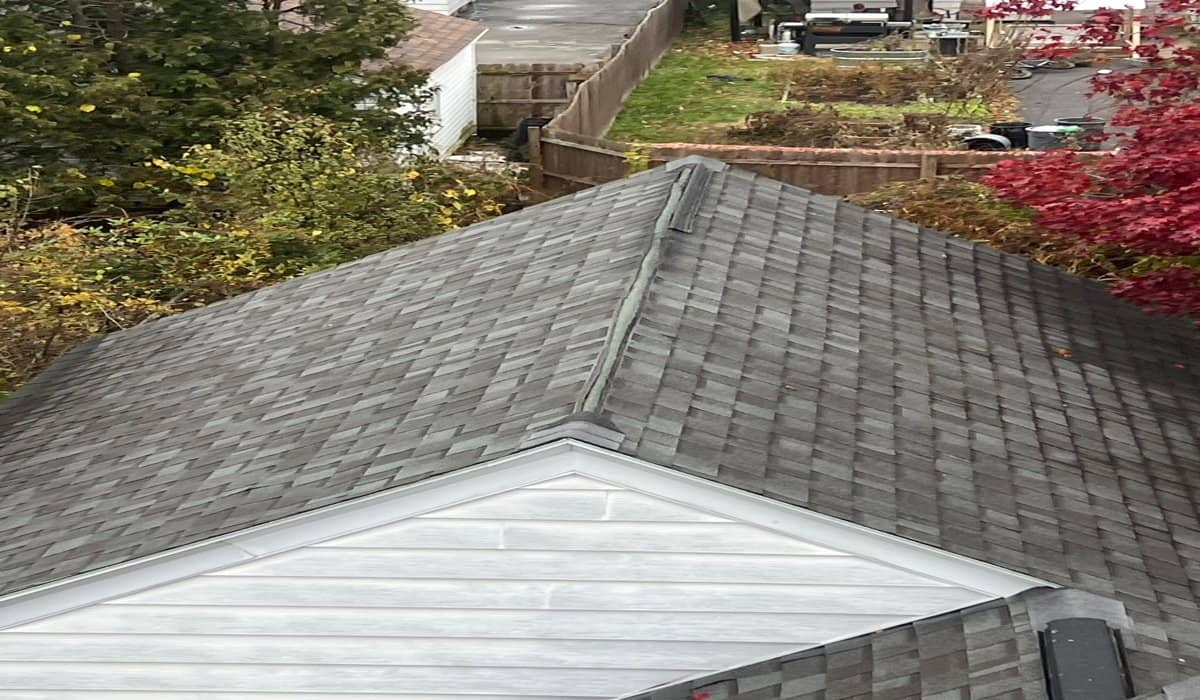 How to Choose the Right Roofing Material for Your Climate how to choose the right roofing material for your climate Residential asphalt shingle roof showing durable roofing material suitable for different climate conditions