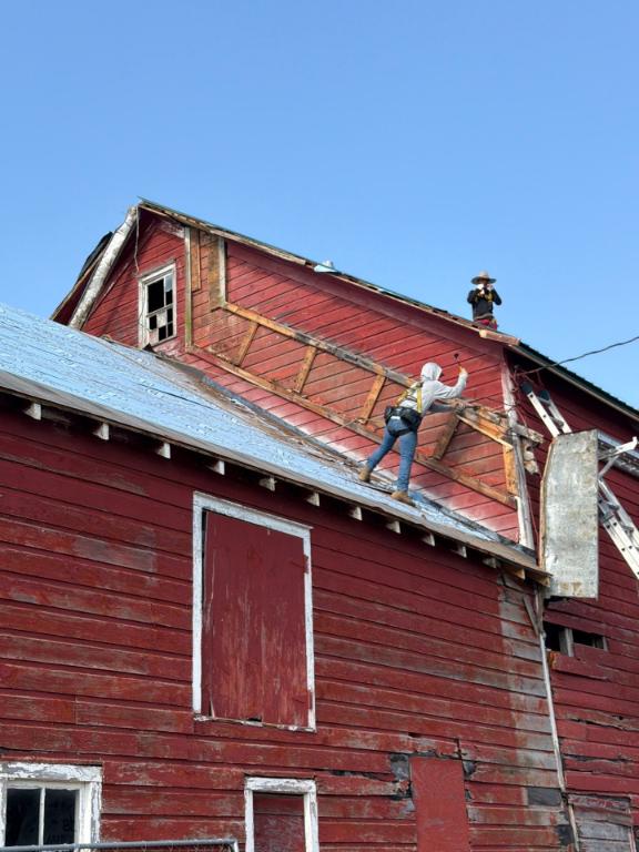 Siding contractor working on a home in Kinderhook NY
