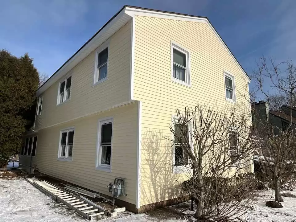 Professional siding replacement by Center Construction Roofing