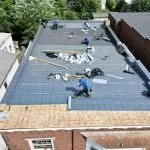 Modified flat roof installation project on a commercial building in Albany NY