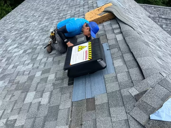 Roof Ventilation System Installation for Residential Homes Roof Ventilation System Installation for Residential Homes A professional worker installing a roof ventilation system on a residential shingle roof, ensuring proper airflow and attic ventilation.