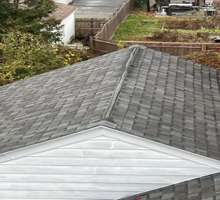 How to Choose the Right Roofing Material for Your Climate how to choose the right roofing material for your climate Residential asphalt shingle roof showing durable roofing material suitable for different climate conditions