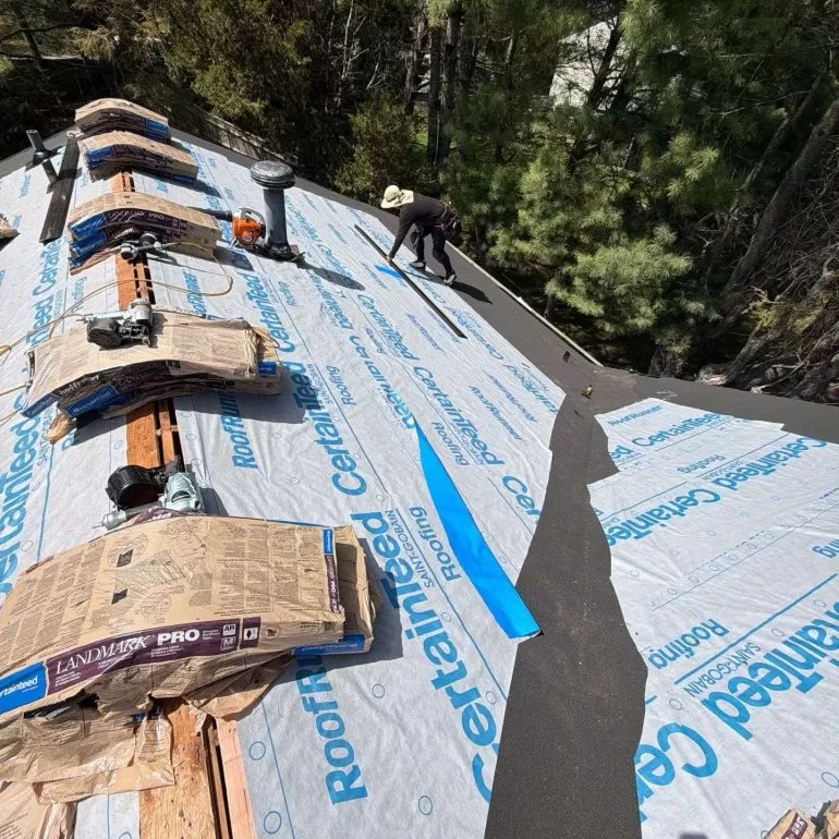 Roof Repair vs Roof Replacement: Which Option Is Better? roof repair vs roof replacement damaged roof Damaged asphalt shingle roof being removed during a residential roof replacement project