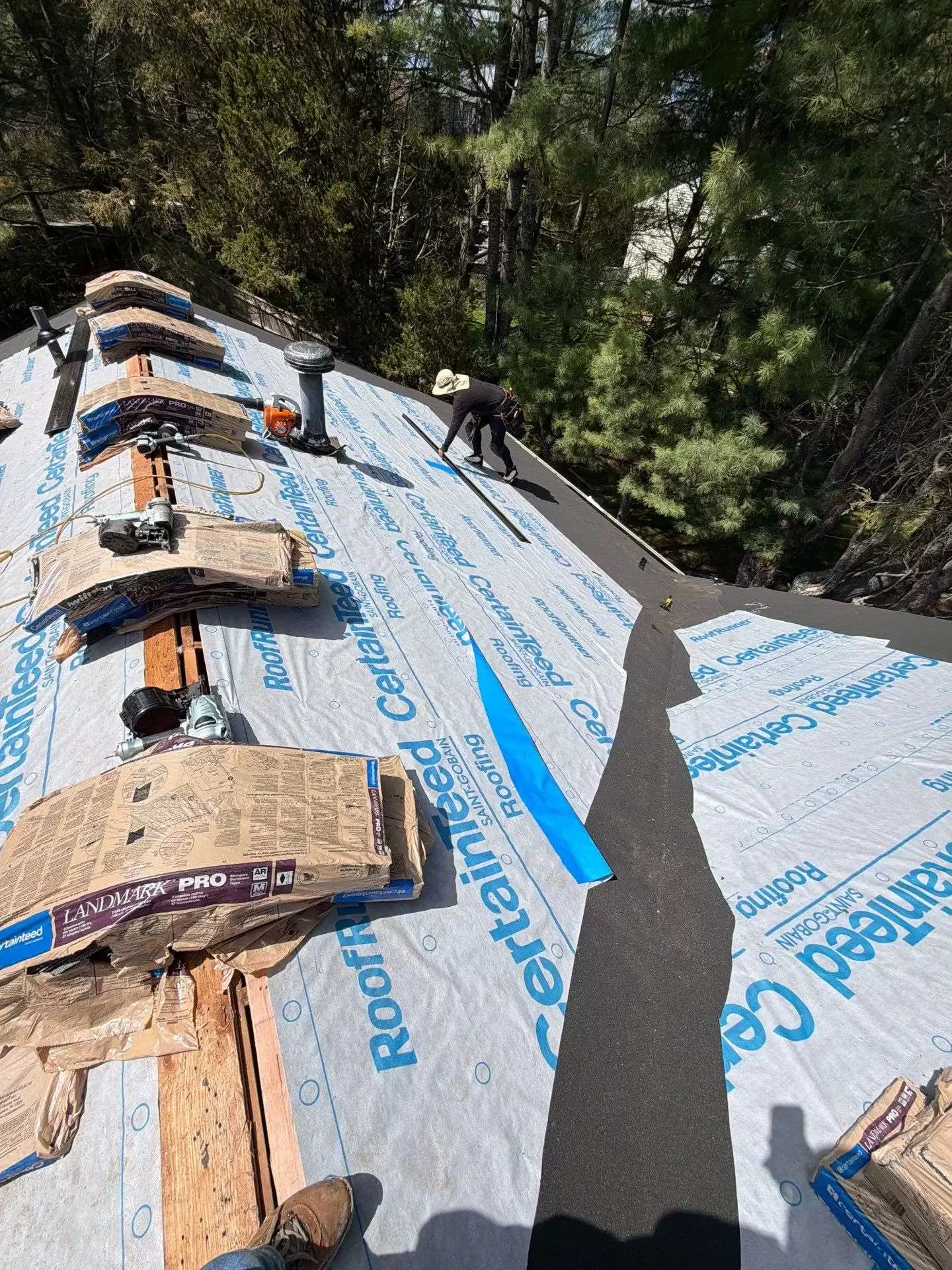 Roof Repair vs Roof Replacement: Which Option Is Better? roof repair vs roof replacement damaged roof Damaged asphalt shingle roof being removed during a residential roof replacement project
