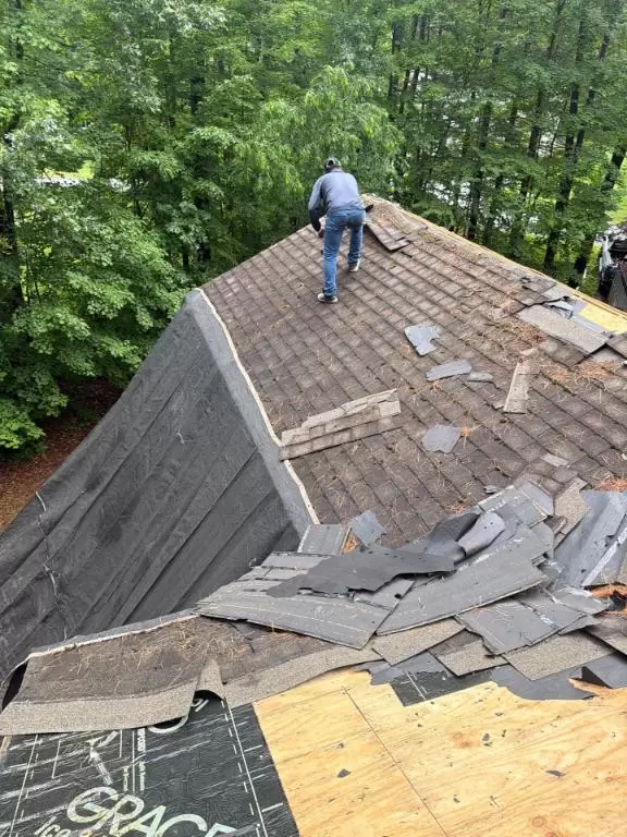 Roofing contractor working on a home in North Chatham NY
