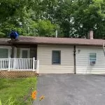 Professional roof eave ventilation upgrades completed on a residential asphalt shingle roof by Center Construction Roofing.