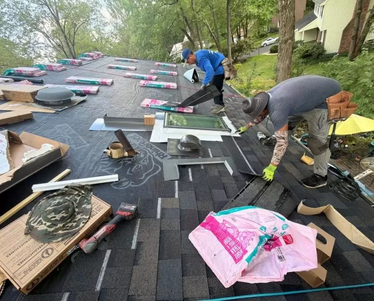 Asphalt Shingle Roof Underlayment Installation: Why It Matters Before New Shingles asphalt shingle roof underlayment installation Professional roofers installing synthetic underlayment before asphalt shingles during a residential roof replacement.