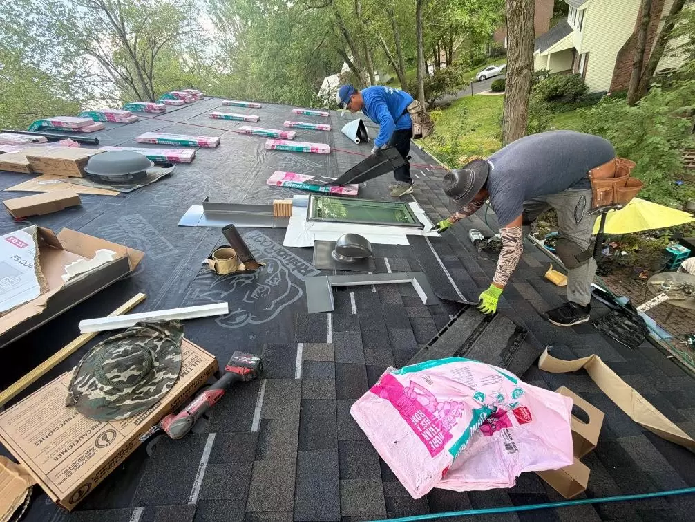 Asphalt Shingle Roof Underlayment Installation: Why It Matters Before New Shingles asphalt shingle roof underlayment installation Professional roofers installing synthetic underlayment before asphalt shingles during a residential roof replacement.